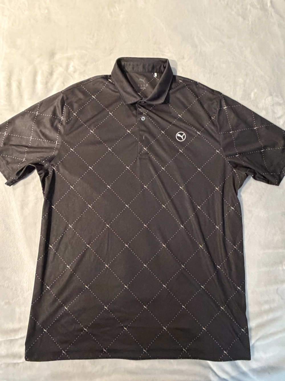 Puma Black Polo with Subtle Diamond Dot Pattern